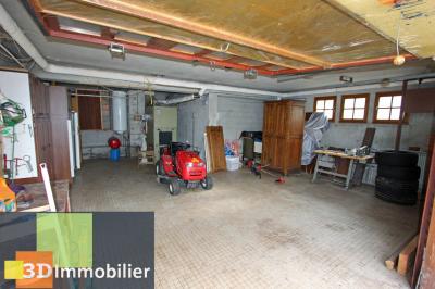 Secteur Clairvaux-les-Lacs (39 JURA), à vendre grande maison d’architecte sur 4689 m² de terrain., REZ-DE-CHAUSSEE : DOUBLE GARAGE AVEC CHAUFFERIE