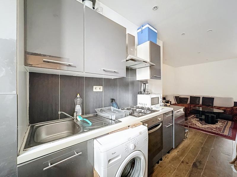 Immeuble mixte avec commerce loué + appartement
