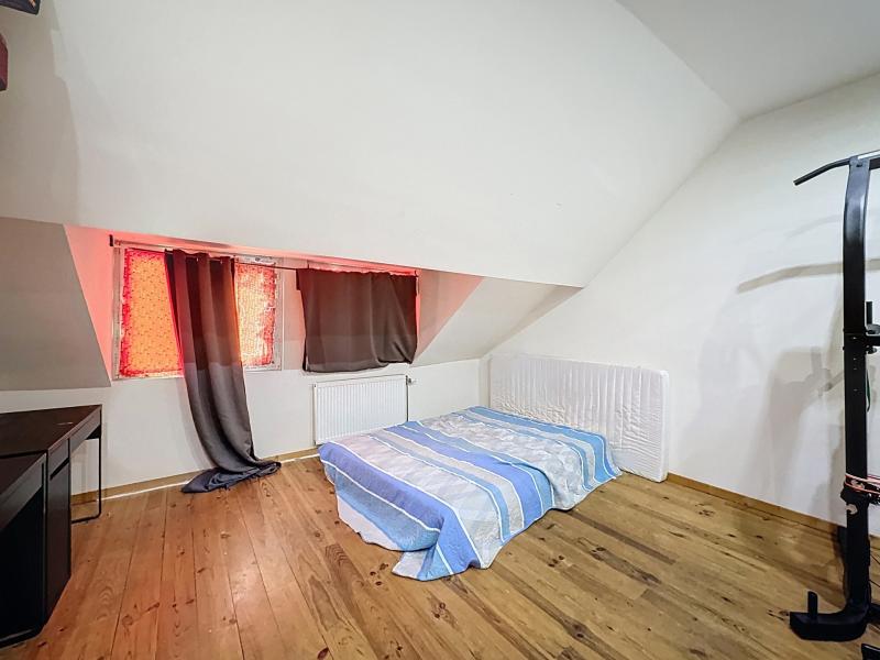 Immeuble mixte avec commerce loué + appartement