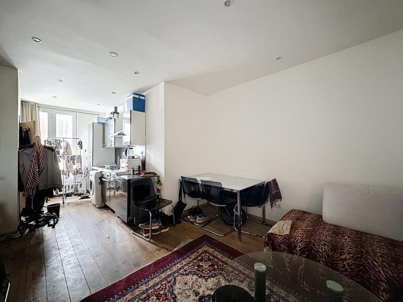 Immeuble mixte avec commerce loué + appartement